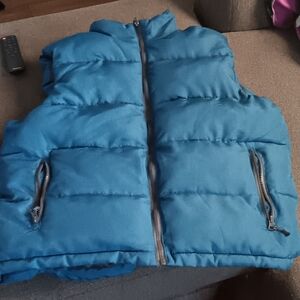 Like New blue puffer vest unisex